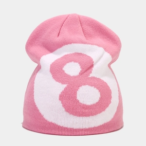 Close-up of pink knit beanie featuring a white circle with a pink number 8 detail