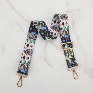 Adjustable bag strap featuring colorful snake skin pattern and durable gold metal hooks
