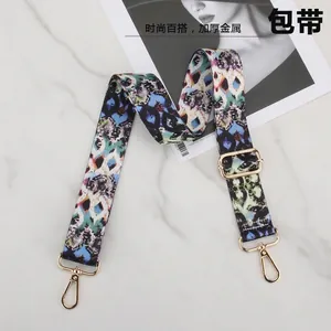 Adjustable bag strap featuring colorful snake skin pattern and durable gold metal hooks