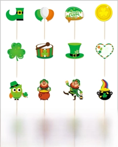 Macro view of twelve assorted St. Patrick's Day cupcake toppers with clover and rainbow motifs