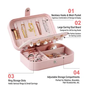 Pink PU leather jewelry box with multiple compartments for rings and necklaces