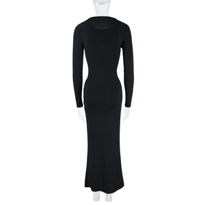Detailed back view of a slim-fit long-sleeve black maxi dress with side waist ruching