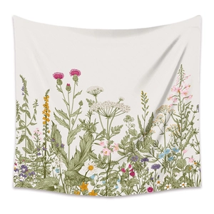 Macro detail of bohemian botanical tapestry featuring vintage wildflower illustrations