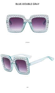 Detail of square oversized blue sunglasses with sparkling rhinestones and gradient lenses