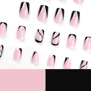 Pink press-on nails with black and white wave lines in a long coffin style layout