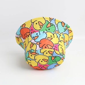 Double-sided reversible bucket hat with colorful cartoon yellow duck patterns for sun protection
