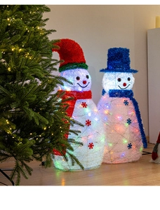 Detail of LED light-up snowman figurines with colorful hats and festive snowflake patterns