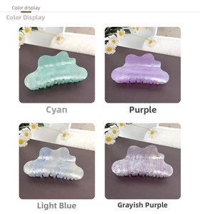 Cloud-shaped hair claws in cyan, purple, light blue, and grey-purple marble finish