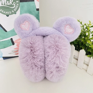 Detail of plush lavender earmuffs featuring pink sequin hearts and soft faux fur texture