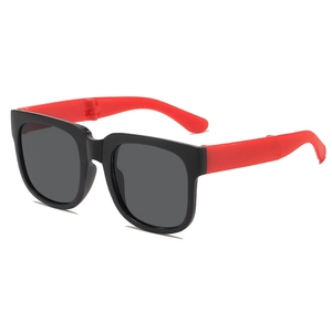 Foldable square kids sunglasses with black frames and red temples for UV protection