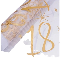 White tulle table runner with gold glitter number 18 and stars for birthday decoration
