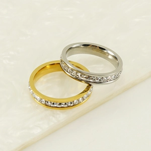 Sparkling stainless steel rings in gold and silver with full circle baguette cubic zirconia