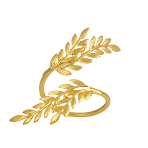 Golden wheat leaf napkin ring with metallic plated finish on a white background