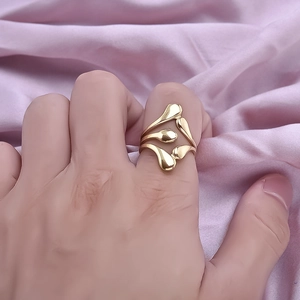 Minimalist 304 stainless steel gold layered teardrop ring for women on purple silk