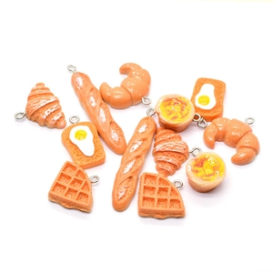 Realistic bread and pastry resin pendants including croissants and waffles with metal rings