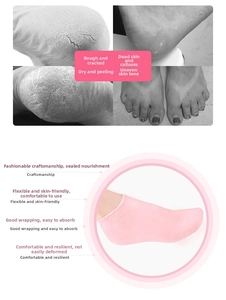 Detail of pink silicone moisturizing foot socks showing elastic texture and size M marking