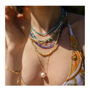 Layered summer necklace set with colorful beads, natural stones and large white pearl