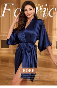 Detail view of smooth navy blue satin fabric and tie waist belt of this women's robe