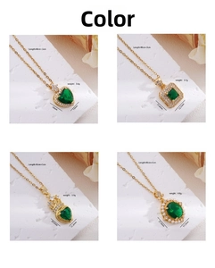 Detail view of vintage emerald crown pendants with precise size and weight specifications