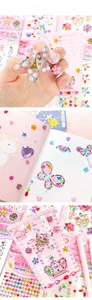 Detailed view of 3D heart and star gem stickers used for decorating a notebook and basket