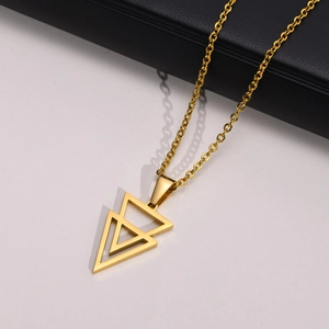 Detailed close-up of golden stainless steel double triangle geometric pendant for men