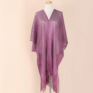 Detailed view of a purple knitted shawl with sparkling silk finish and fringe hem on mannequin
