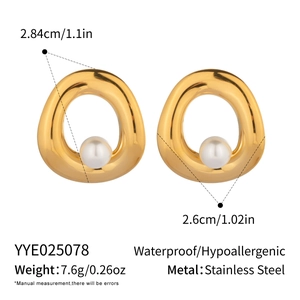 Detailed view of irregular gold stainless steel pearl earrings with size dimensions