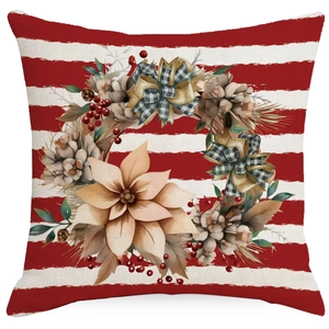Christmas pillow cover featuring red and white stripes with a festive floral wreath