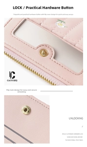 Close-up of pink leather wallet with gold hardware button and small floral embroidery details