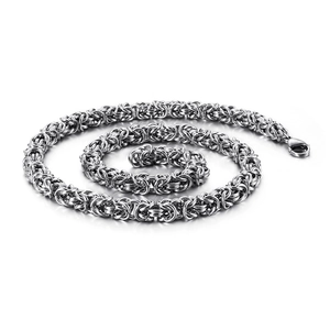 Polished silver Byzantine stainless steel chain necklace for men with intricate woven texture