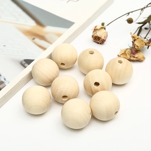 Natural round wooden beads with central holes for DIY crafts and car seat cushion making