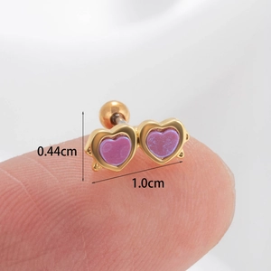 Macro shot of gold double heart cartilage studs showing dimensions 0.44cm by 1.0cm