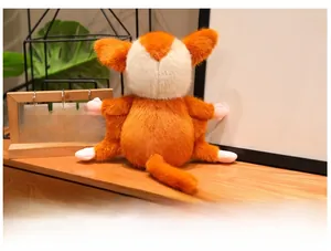 Rear view of orange plush sugar glider doll with fluffy fur and soft texture details