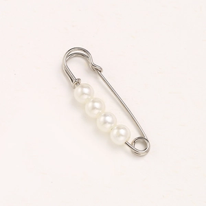 Silver waist cincher pin featuring four elegant white pearls for clothing adjustment