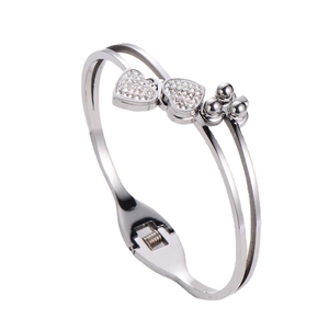 Elegant silver open heart bangle with sparkling rhinestones and metal bead accents