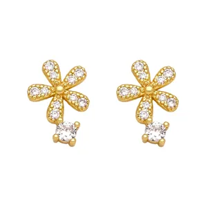 Elegant gold flower stud earrings featuring white cubic zirconia and a hanging crystal drop