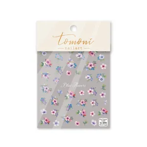 Close-up of to-245 embossed 5D floral nail stickers with blue watercolor flower patterns