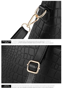 Close-up of crocodile texture bag with light gold hardware and adjustable strap
