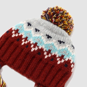 Winter knit beanie for kids with ear flaps and colorful pom-pom in retro jacquard style