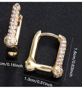 Macro detail of gold geometric hoop earrings with zircon pavé and size dimensions