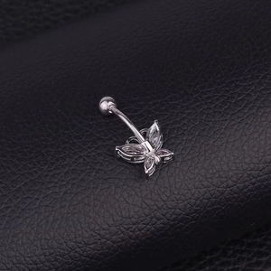 Silver butterfly navel ring with cubic zirconia stones on a black leather background