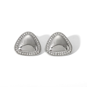 Detail view of silver triangle stud earrings with rhinestone borders and polished metal center