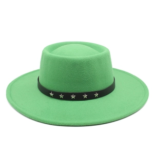 Detail of green felt hat with black leather band featuring silver star studs decoration