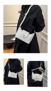 Three-angle views of a white glossy leather shoulder bag with gold metal clasp detail