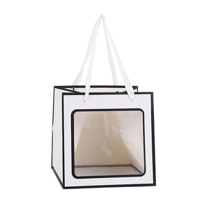 White square gift bag with transparent window and black piping for flower and cake packaging