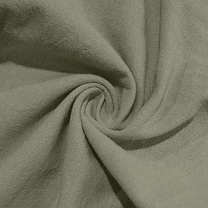 Macro trama del tessuto in lino-cotone verde oliva con motivi a trama traspirante