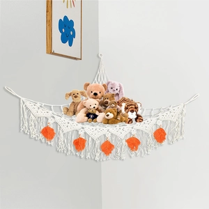 Boho woven plush toy hammock with orange leaf tassels for corner wall storage