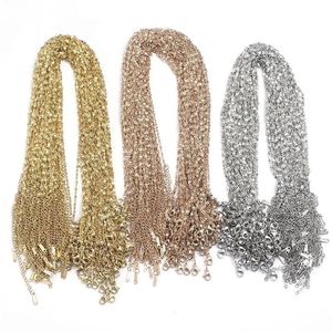 Detailed view of O-chain necklace sets in gold, rose gold, and silver stainless steel