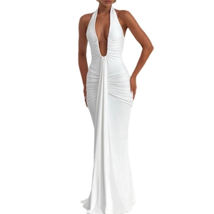 Elegant white deep V-neck halter maxi dress with ruched waist and flowing silk-like texture