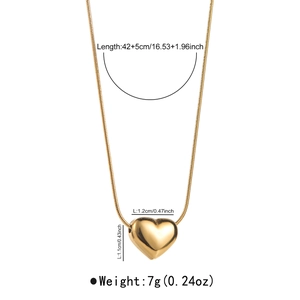 Detailed view of gold heart pendant necklace with dimensions 1.2x1.1cm and 47cm chain